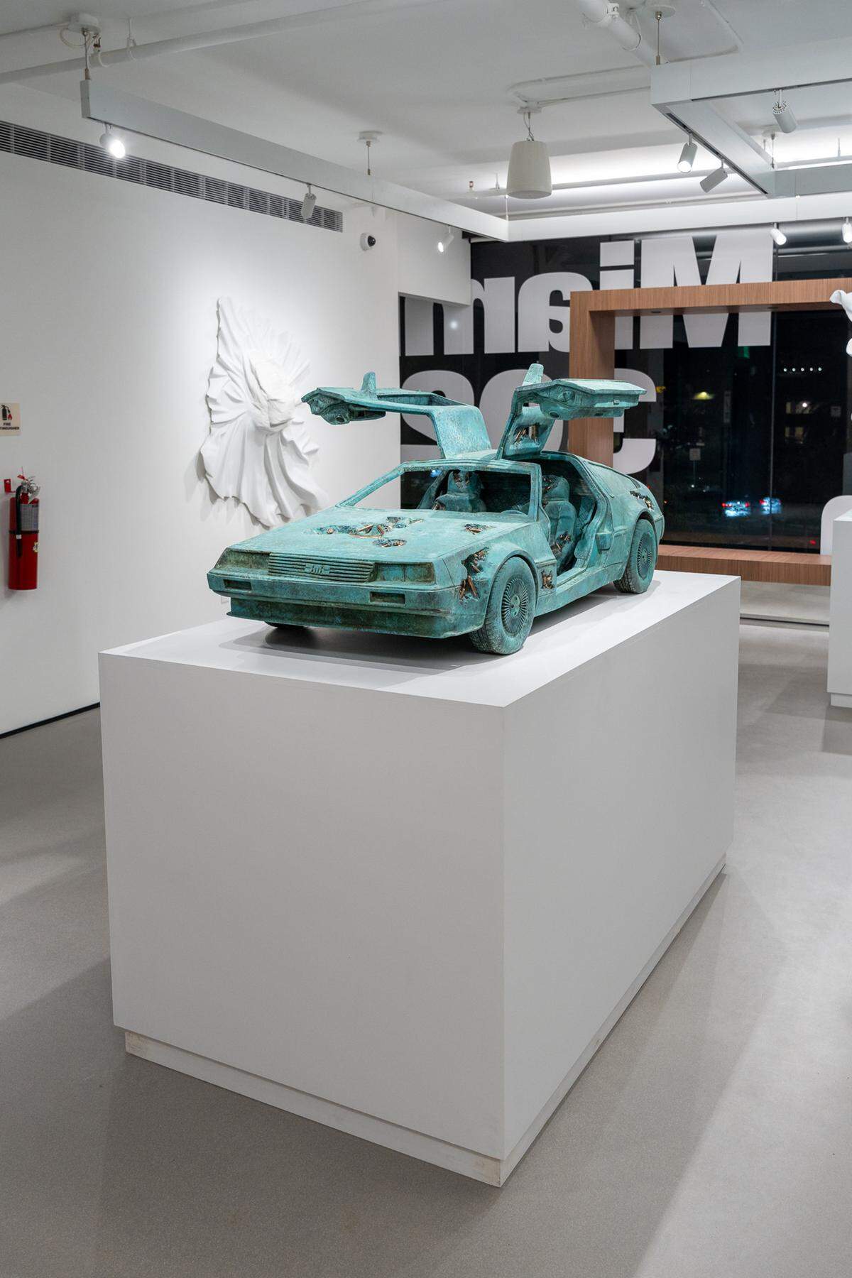 “Eroded Delorean Bronze” by artist Daniel Arsham on display for his solo exhibition “Miami 3023” at Ross+Kramer Gallery in Miami Beach.