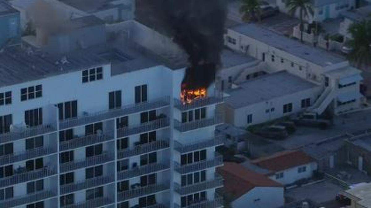 Footage taken from CBS Miami’s Chopper 4 helicopter show flames and smoke coming out of one of the units at the Edgewater Beach Towers, a 13-story oceanfront condominium complex located at 400 North Surf Road.