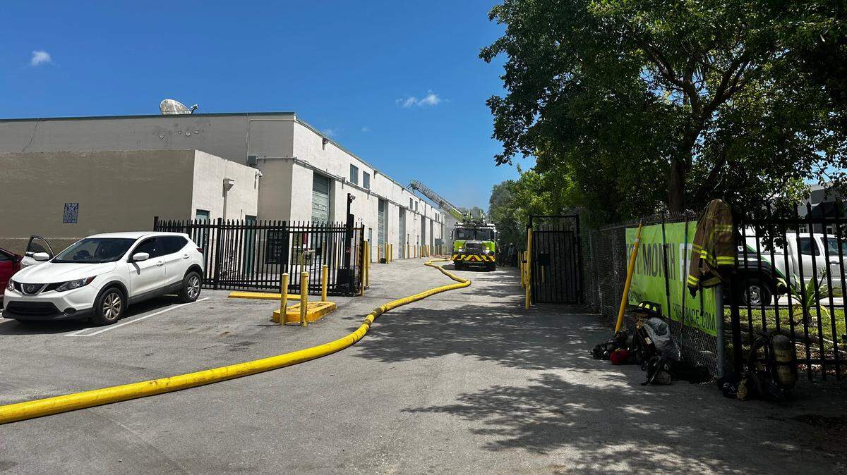 Miami-Dade Fire Rescue deployed more than 35 first responders to battle a three-alarm fire at a storage facility in Miami Gardens.
