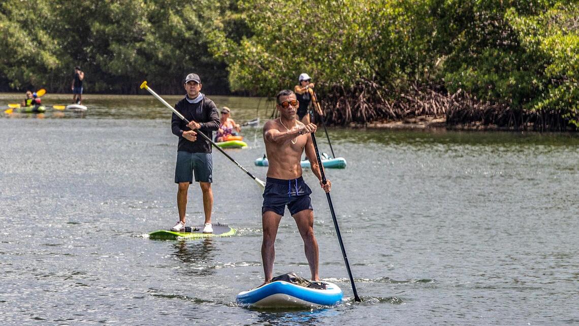 Protesters on paddle boards condemn Miami’s plan for tiny homes for the homeless
