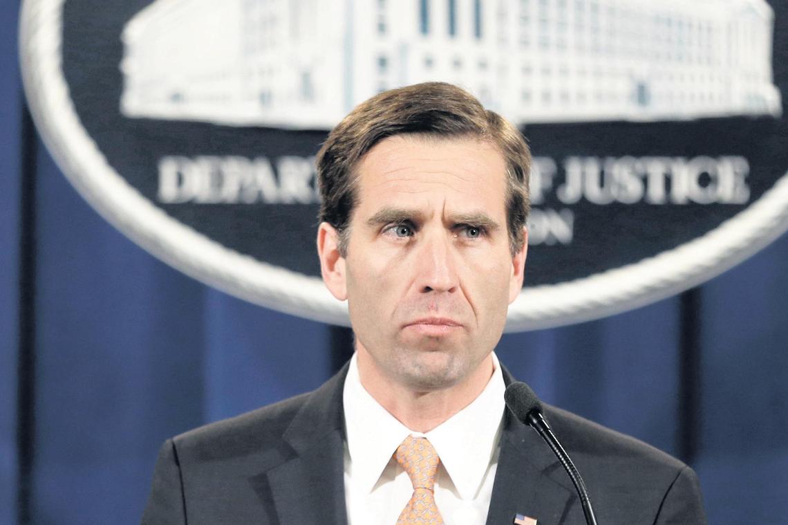 In this Feb. 5, 2013, file photo, then-Delaware Attorney General Beau Biden is seen at the Justice Department in Washington.  Biden, the son of former Vice President Joe Biden, died of brain cancer in 2012.