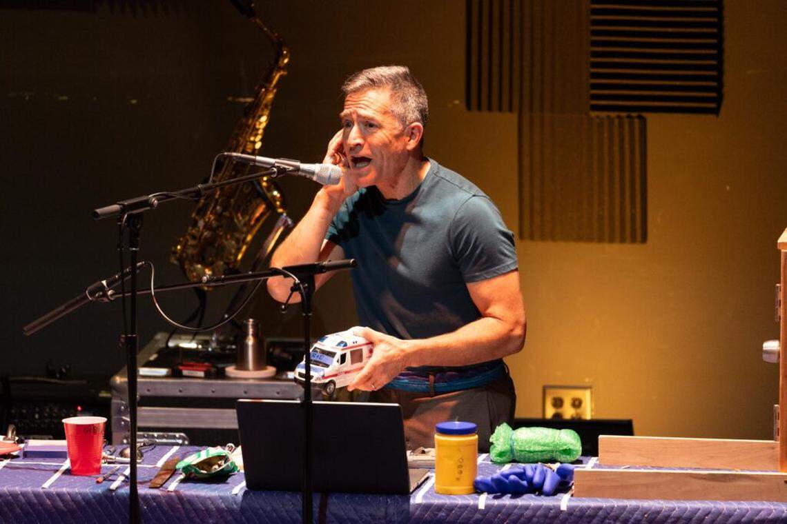Dan Froot in “Arms Around America.” The live radio drama, presented by Dan Froot & Co., Live Arts Miami and Miami Light Project, examines America’s relationship with guns.