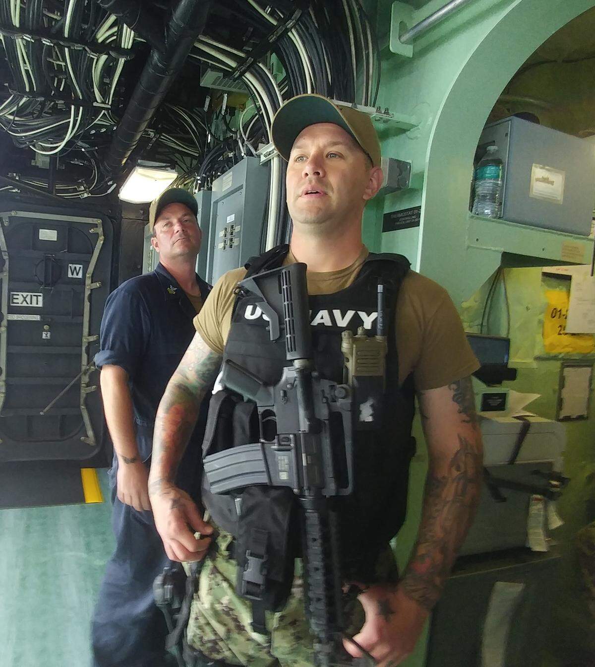 A sailor is aboard the USS Billings, a Navy combat ship, in Key West on Aug. 1, 2019.