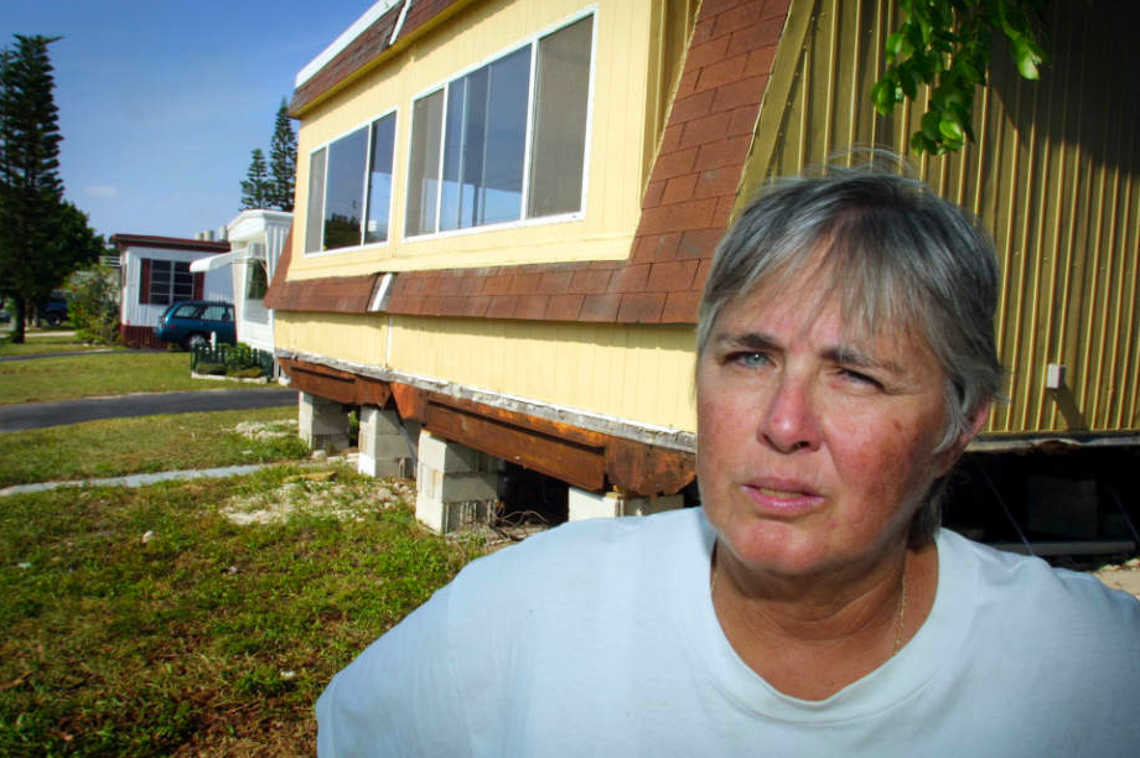 A Herald archive photo shows Priscilla Moody at her home in Dania Beach. Moody, a longtime local chair massage therapist, was forced to close her business due to the pandemic. She is now studying to get her insurance license.