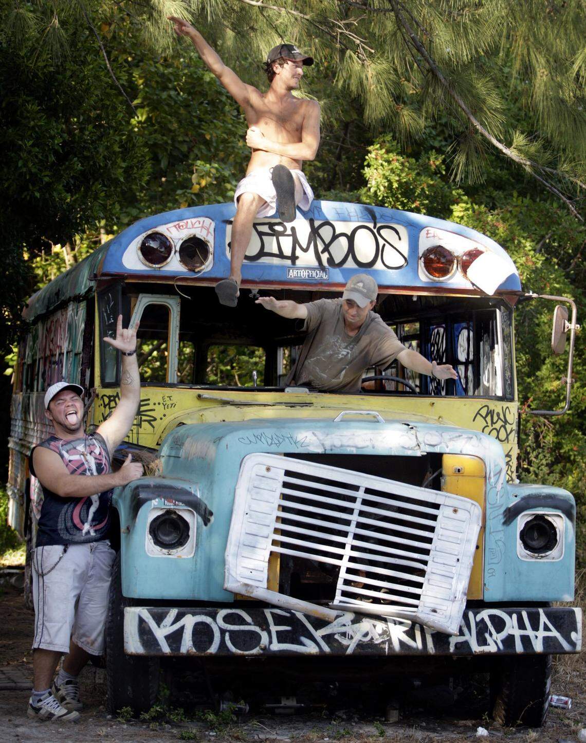 Brian Dumars 22, Stu Banks 24 and Tony Carlyle 36 enjoy the spirits and atmosphere of Jimbo’s.