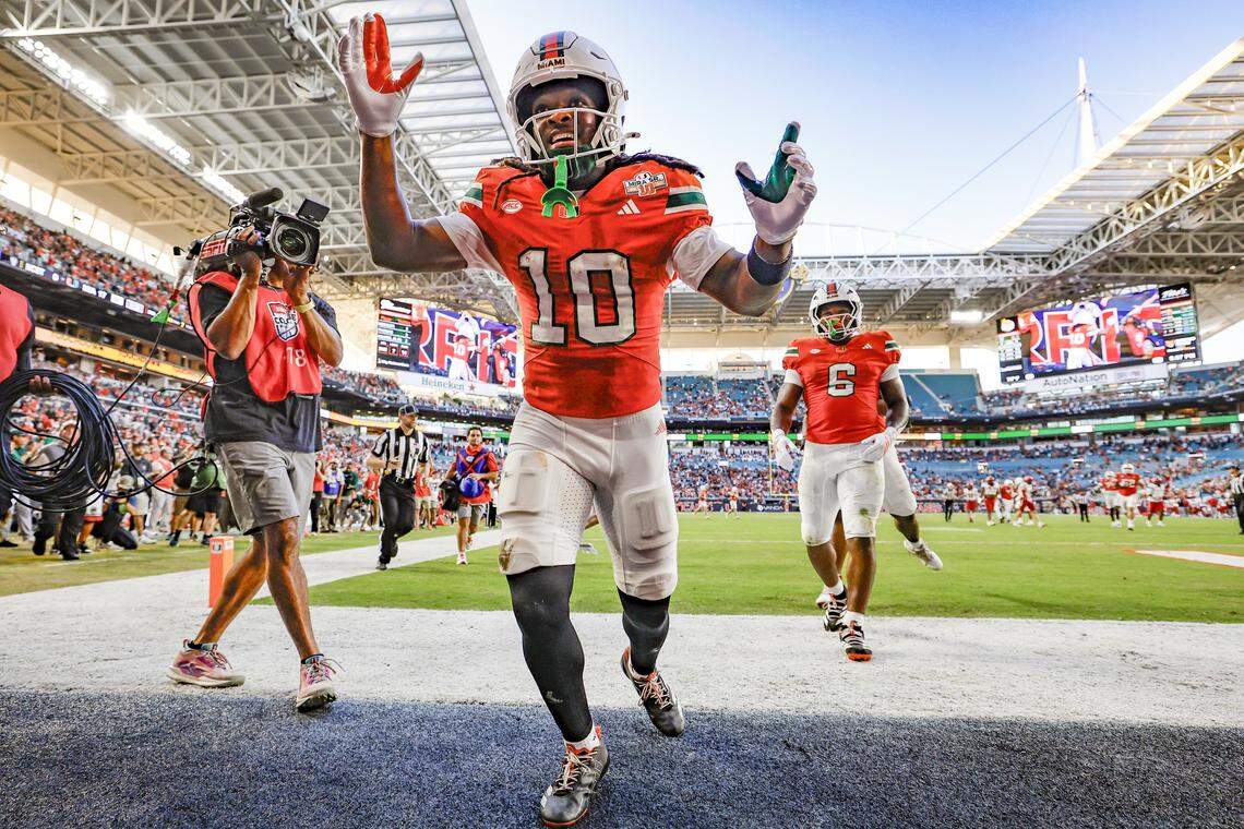 Miami Hurricanes wide receiver Malachi Toney (10) ceelbrates in the endzone after a pass reception for a touchdown against the NC State Wolfpack in the first half of an NCAA football game at Hard Rock Stadium in Miami Gardens, Florida, on Saturday, November 15, 2025.