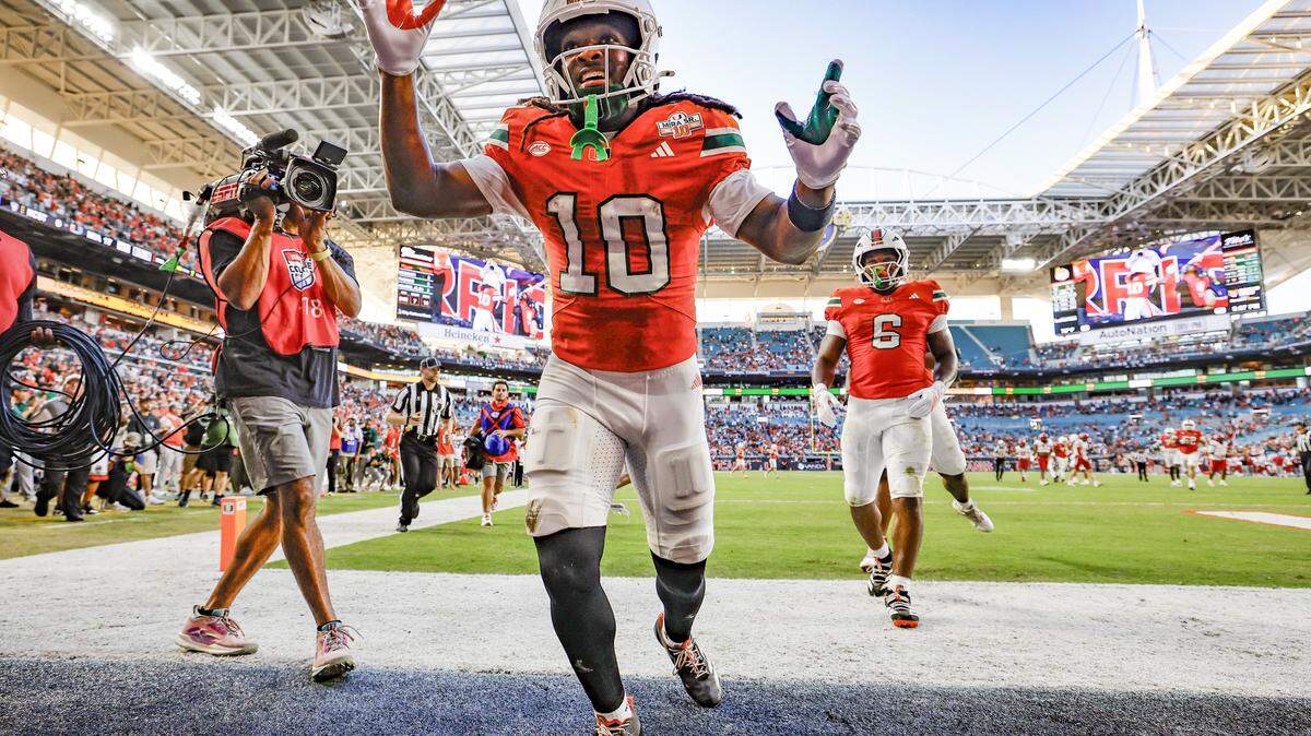Miami Hurricanes wide receiver Malachi Toney (10) ceelbrates in the endzone after a pass reception for a touchdown against the NC State Wolfpack in the first half of an NCAA football game at Hard Rock Stadium in Miami Gardens, Florida, on Saturday, November 15, 2025.