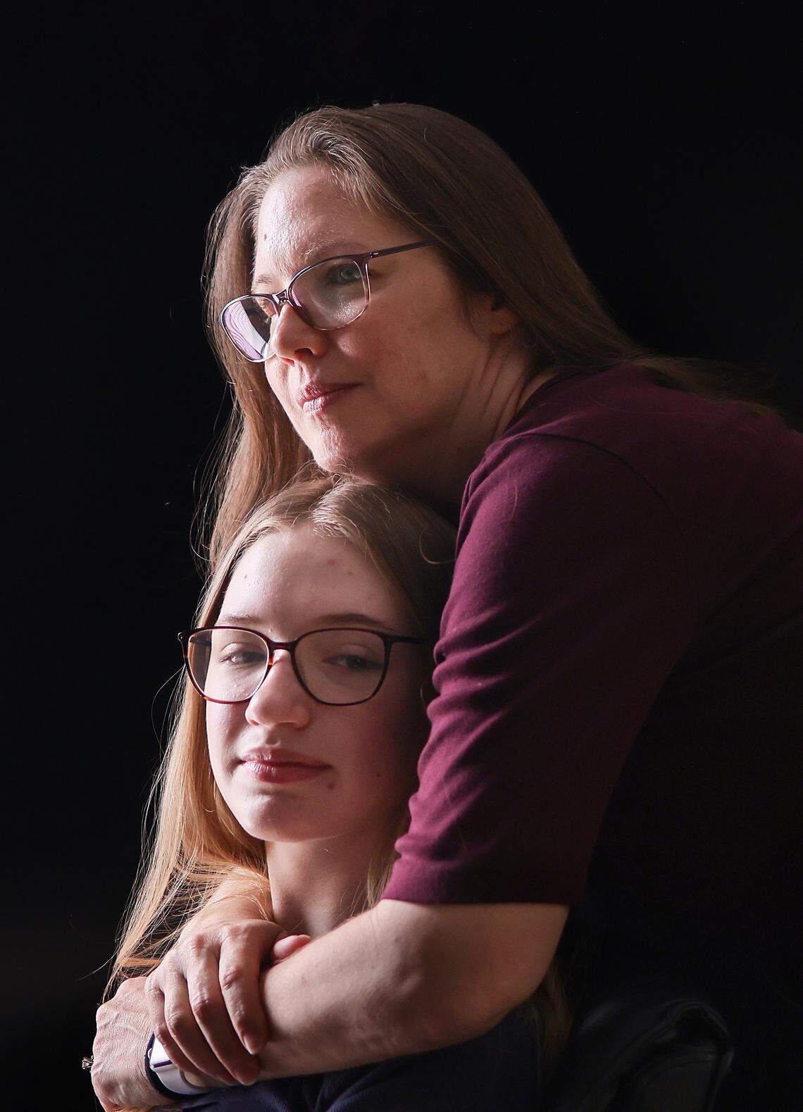  Christina Underwood, right, embraces her 13-year-old daughter, Harper, who had a medical emergency and nearby hospitals rejecting her Florida Blue insurance coverage on Thursday, February 12, 2026, in Fort Lauderdale, Florida. 