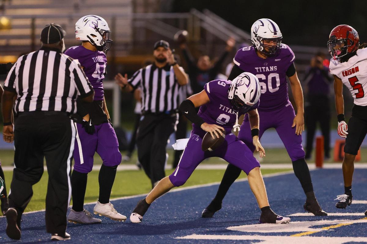 True North Titans quarterback Zachary Katz (9) celebrates after scoring a touchdown against the Edison Red Raiders during the second quarter of a high school football Class 1A Region 4 playoff game at Tropical Park in Miami, Florida, on Thursday, November 21, 2024.