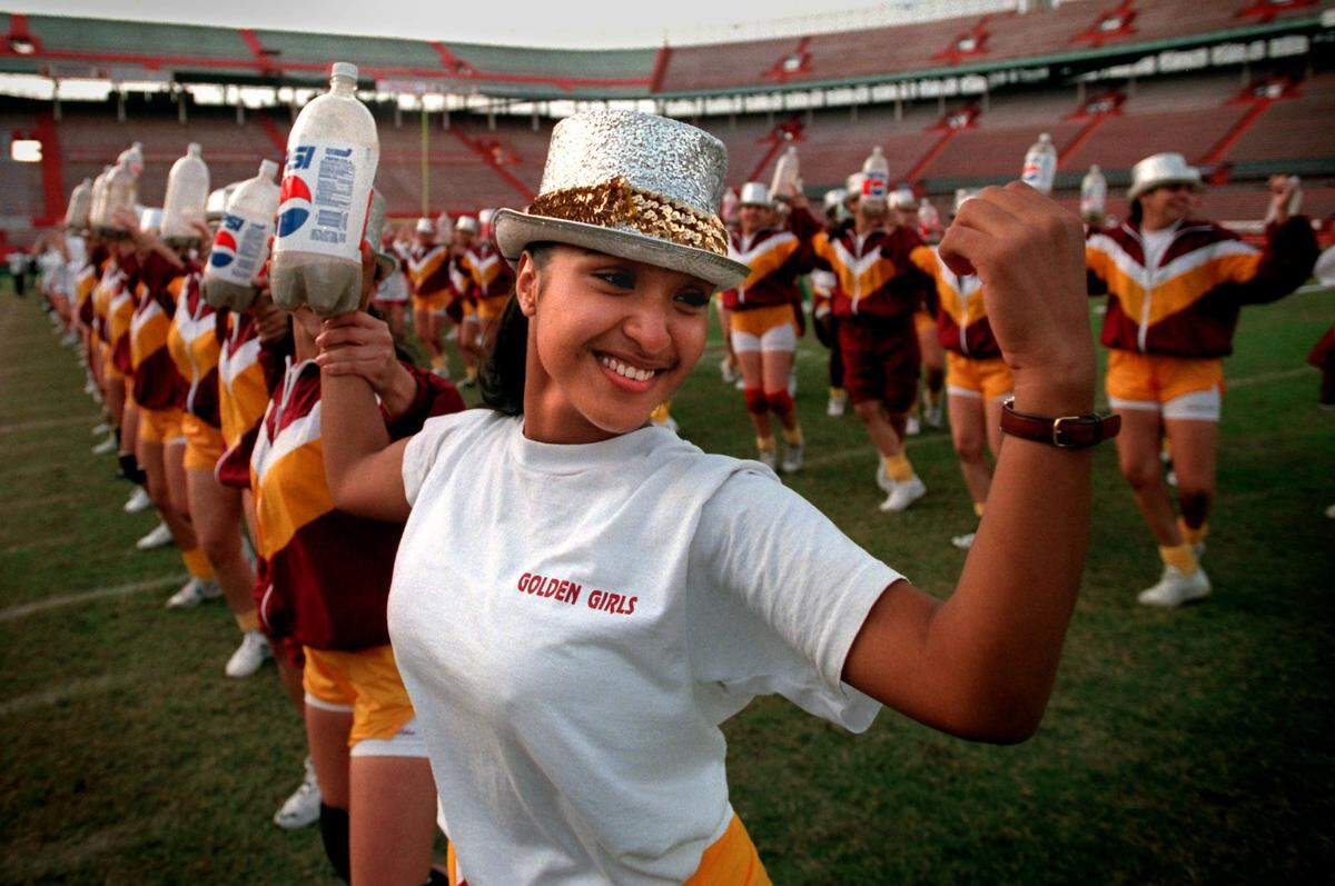 Miami Springs Golden Girls co-captain Marino Romero, 18, dances during rehearsal for the 1995 Fedex Orange Bowl halftime show at the stadium.