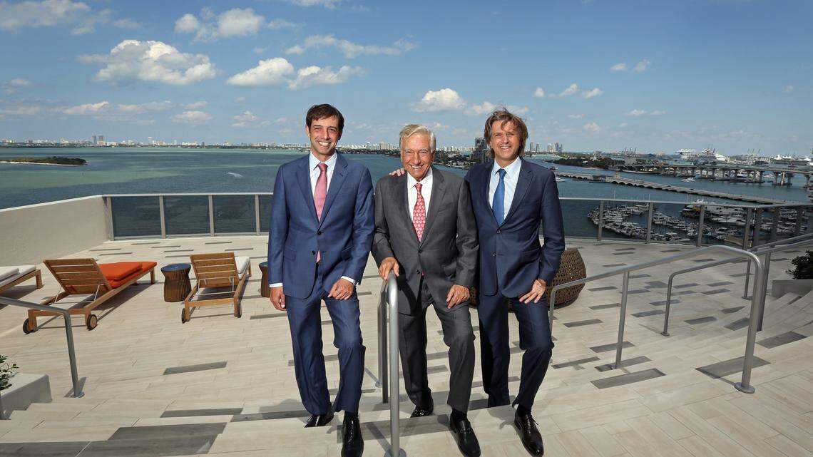 The Melo Group, father Dr. Jose Luis Ferreira de Melo (center) and his two sons, Martin (L) and Carlos (R) stand on the 14th floor pool resort deck of the brand new Aria on the Bay in Edgewater Monday, April 30, 2018.  The development firm from Argentina has built a number of condo and apartment buildings in Edgewater and downtown Miami since 2001.