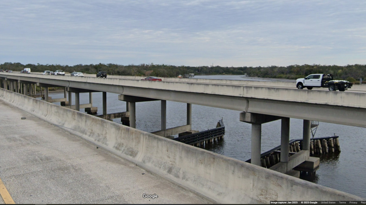The 35-year-old Spring Hill man was “propelled” off the bridge as he stood beside his Honda Civic, investigators say.