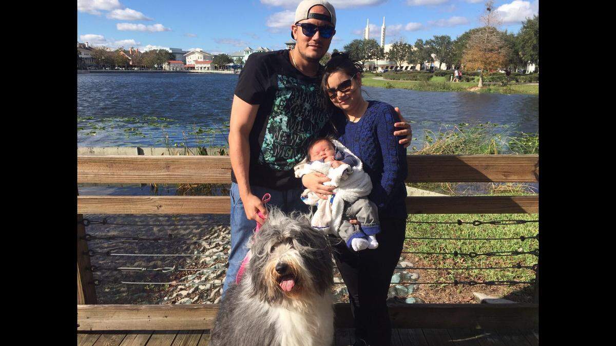 Miguel Rojas with his family and the pet dog he loved so much, Almudena.