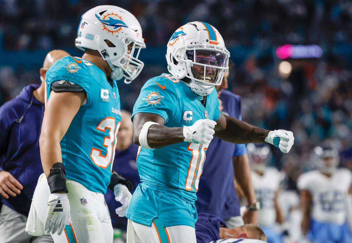 Miami Dolphins wide receiver Tyreek Hill (10) reacts after catching a pass in the third quarter against the Tennessee Titans at Hard Rock Stadium in Miami Gardens, Florida on Monday, December 11, 2023.