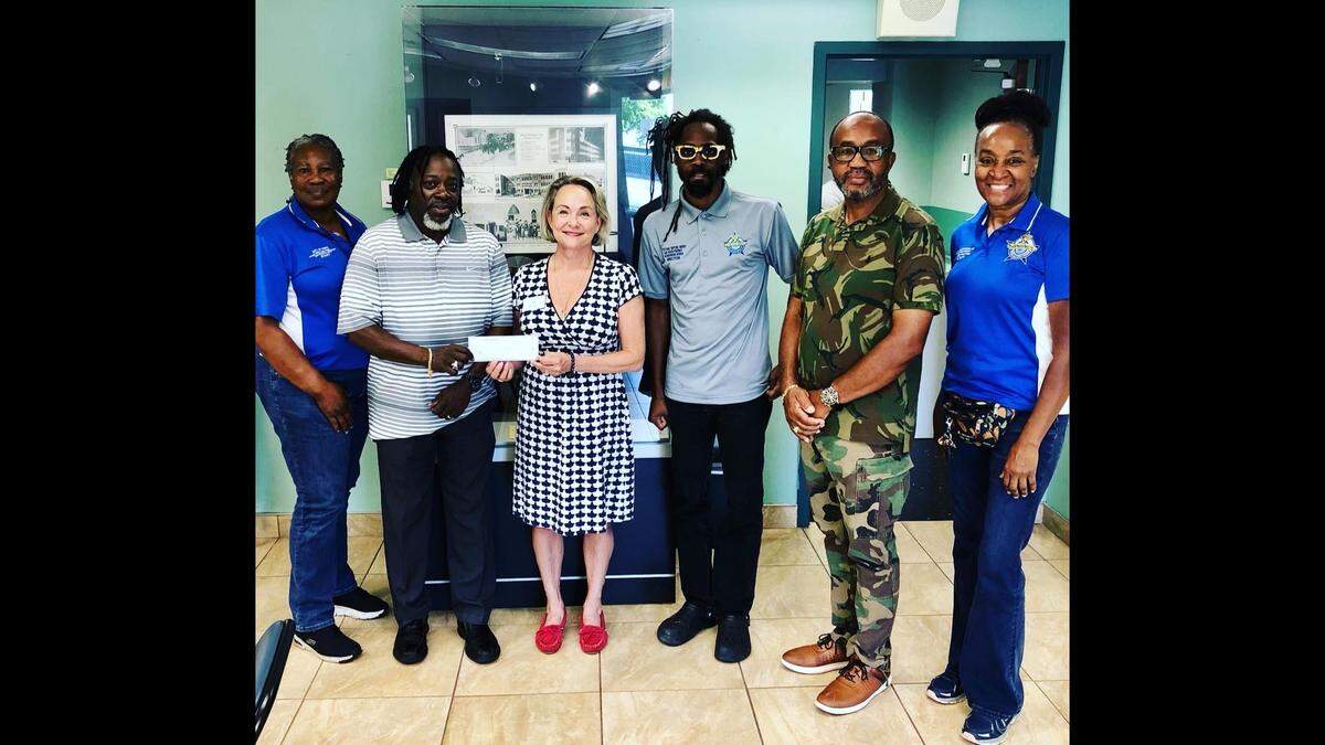 Attending The Villagers grant presentation ceremony at the Black Police Precinct and Courthouse Museum are, from left, Sgt. Deborah Payne, Black Police Museum (BPM) Board Parliamentarian; Lt. James Marshall, Jr., BPM Board President; Kelley Schild, Villagers’ 1st Vice President; Terrance Cribbs-Lorrant, Museum Director/Curator; Sgt. Erol Stewart Jr.,&nbsp;BPM Board Vice President; and Chief Anita Najiy, BPM Board Treasurer&nbsp;and Girl Scout Troop 1877 Leader. Board members of the Black Police Museum are all former City of Miami Police Officers.