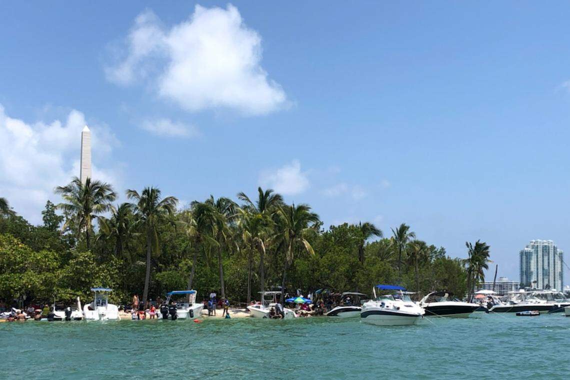 Boats congregate around Monument Island earlier this year.