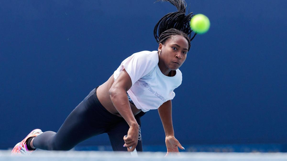 Coco Gauff of USA serves during practice at the Miami Open tennis tournament at Hard Rock Stadium on Tuesday, March 21, 2023 in Miami Gardens, Fl. She is a baseball fan and planned to go with her family to the World Baseball Classic final between USA and Japan Tuesday night at loanDepot Field in Miami.