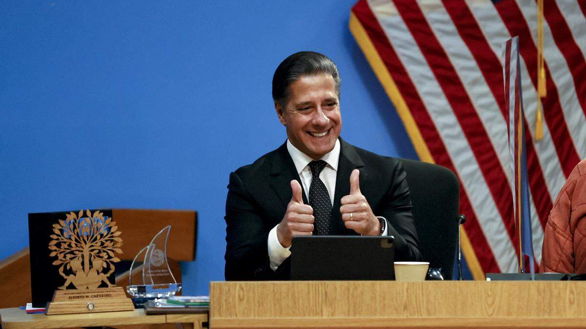 Miami-Dade Public Schools Superintendent Alberto Carvalho reacts during his final meeting at the Miami-Dade County School Board administration building in Miami, Florida on Wednesday, Feb. 9, 2022. On Wednesday, Feb. 25, 2026, the FBI raided his home and office in Los Angeles, where he is the school superintendent.