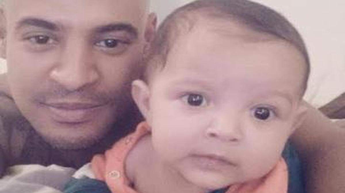 
'Baby Andres' with his father, 32-year-old Adolfo Bravo. Andres would have been 6-months old Sunday. 
