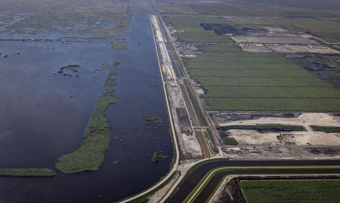 The construction site of the Everglades Agricultural Area reservoir, to the right, lies alongside a flow equalization basin, designed to store stormwater.