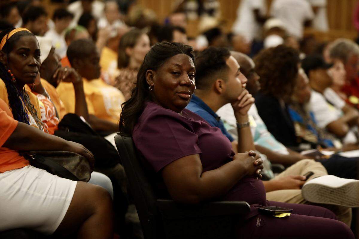 Housing advocate Trenise Bryant joins fellow supporters of Miami-Dade County’s eviction-prevention programs at the budget hearing on Thursday, Sept. 5, 2024.