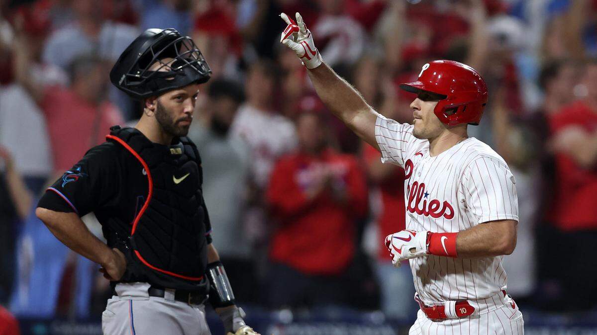 Oct 4, 2023; Philadelphia, Pennsylvania, USA; Philadelphia Phillies catcher J.T. Realmuto (10) reacts after hitting a solo home run against the Miami Marlins during the fourth inning for game two of the Wildcard series for the 2023 MLB playoffs at Citizens Bank Park.