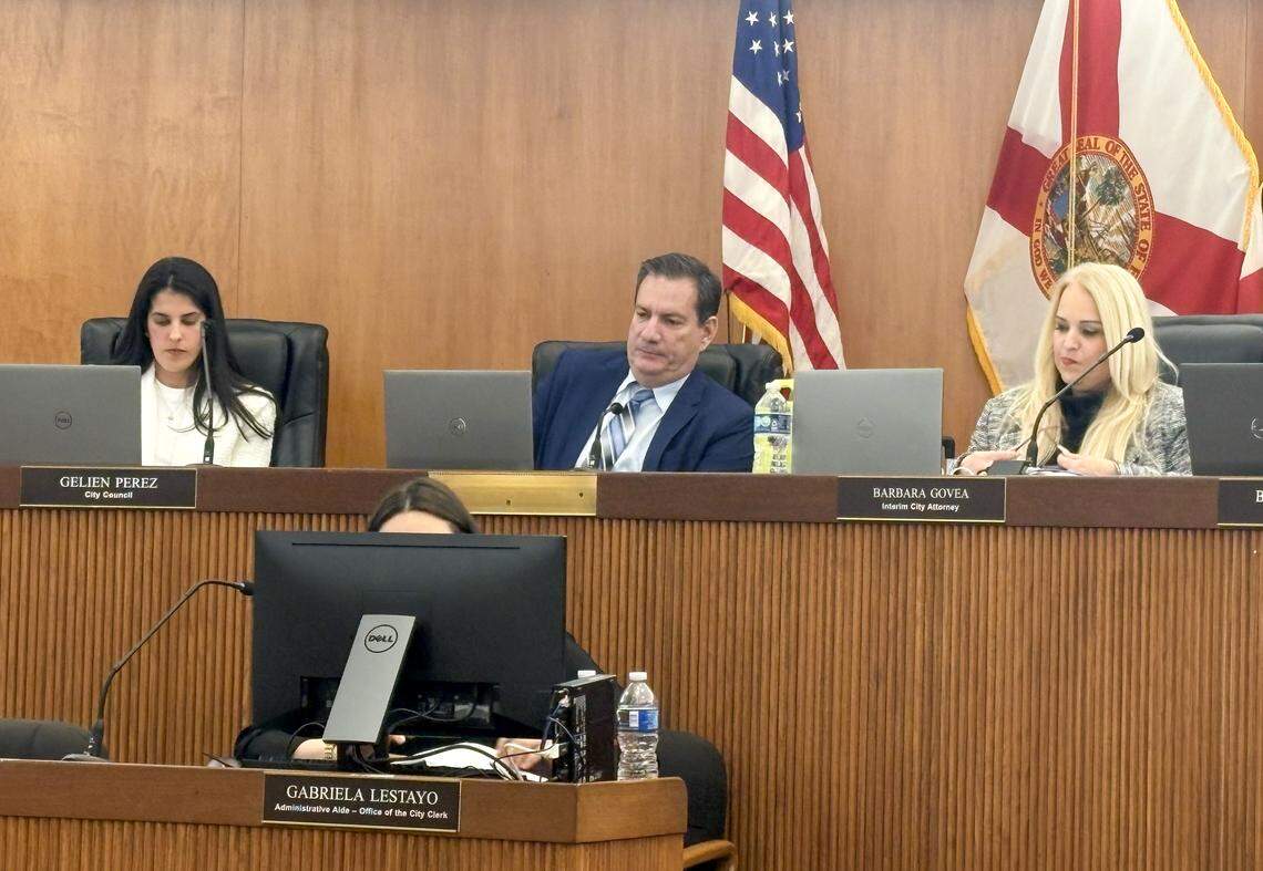 Councilwoman Gelien Perez (left) next to newly appointed Councilman Luis González (center), who was sworn on Tuesday night to fill a vacant Hialeah City Council seat, alongside Interim City Attorney Barbara Govea (right).
