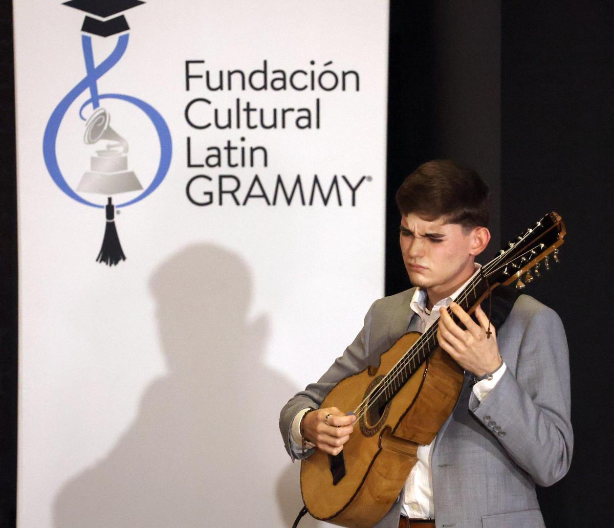 The winner of Juanes Scholarship, Xavier Cintrón, performs with Juanes on Tuesday, July 13, 2021 in Miami.  