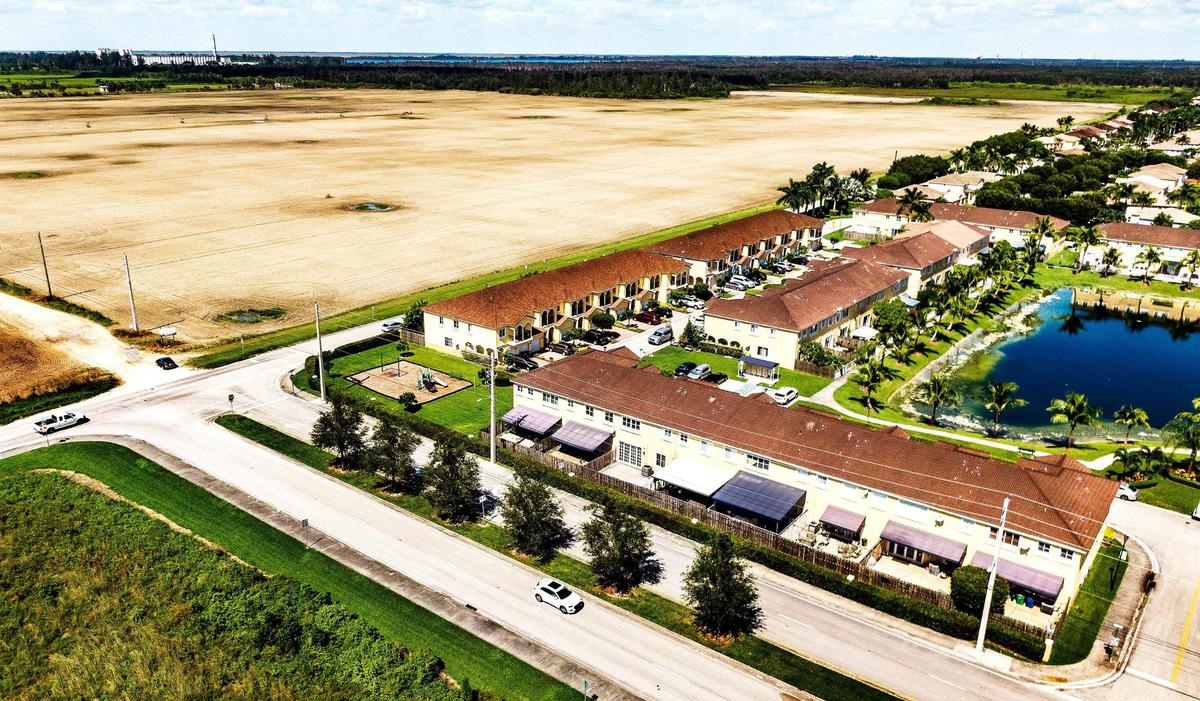 View of a neighborhood next to farm fields located at Sunset Drive and Southwest 167th Avenie, in Kendall. A developer wants to expand Miami-Dade County’s Urban Development Boundary in that area to allow for more residential and commercial development. Photo taken on Saturday, Oct. 16, 2021.