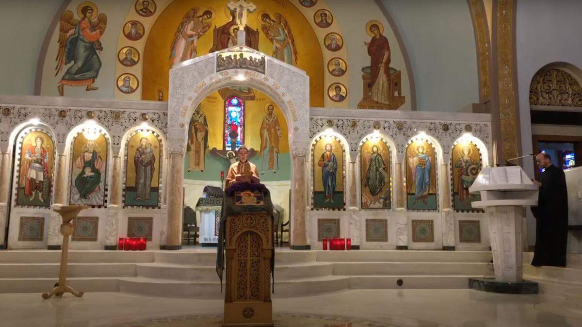 Father Spiro Bobotas streams Holy Week services from Saint Sophia Greek Orthodox Cathedral in Miami. The church is closed to in-person services amid the coronavirus epidemic. The Eastern Orthodox Church follows a different calendar from the Roman Catholic Church and will celebrate Easter on Sunday, April 19, 2020.