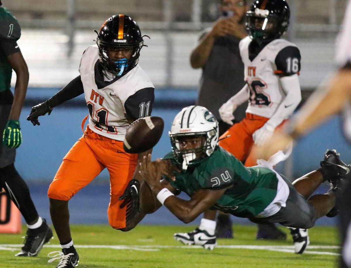 Miami Central Rockets Javari Flowers (24) tries to catch a pass during the regional semifinal football game against Booker T Tornadoes on Friday, November 17, 2023 at Traz Powell Stadium in Miami. Andrew Uloza / for Miami Herald