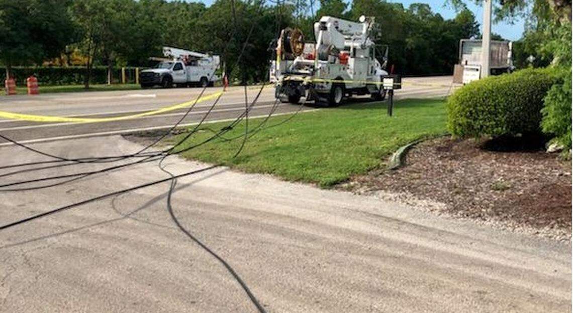 Utility workers were making repairs Nov. 12, 2020, after the sheriff’s office said a garbage truck’s crane collided with a utility pole, knocking out internet and cell service throughout the Keys from mile marker 86 6o Key West.