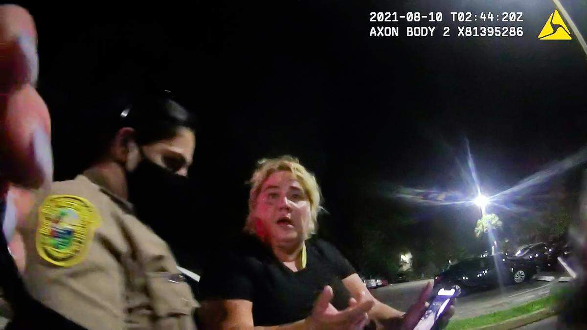 In a body cam video from August 2021, a Kendale Lakes mother, Gamaly Hollis, talks with Miami-Dade police about her mentally ill son, Richard. At one point during the conversation, officer Jaime Pino warns here that the continuing calls to deal with the sometimes violent son could turn deadly if the son brandished a weapon. About a year later, Pino shot and killed her son, Richard Hollis, during a confrontation in the family’s apartment. Pino was later cleared in the shooting.