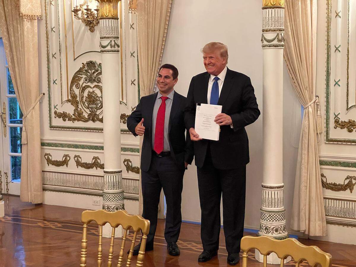Former President Donald Trump with Digital World Acquisition Corp. CEO Patrick Orlando at Mar-a-Lago.