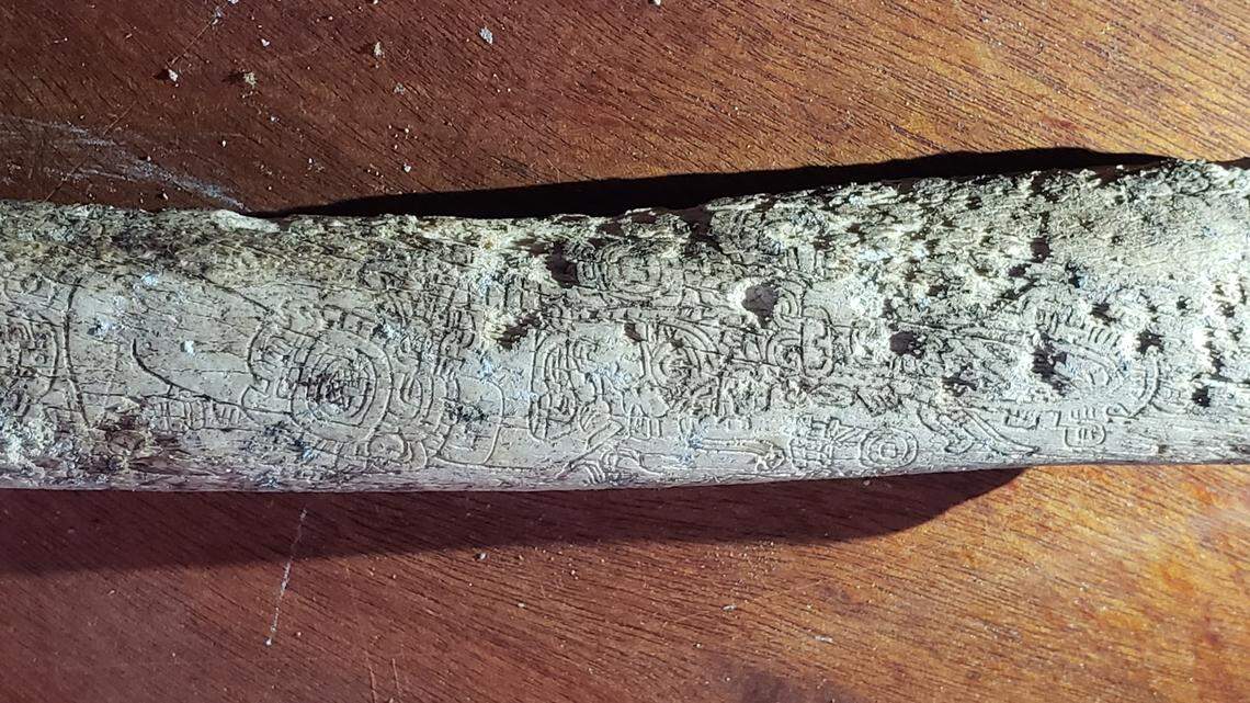 Engraved femur bones were also found within the tomb.