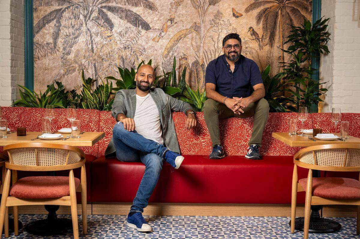 Chef Niven Patel (right) and business partner Mohamed Alkassar have opened the restaurant Paya in Miami Beach, which focuses on upscale island cuisine and locally sourced ingredients.