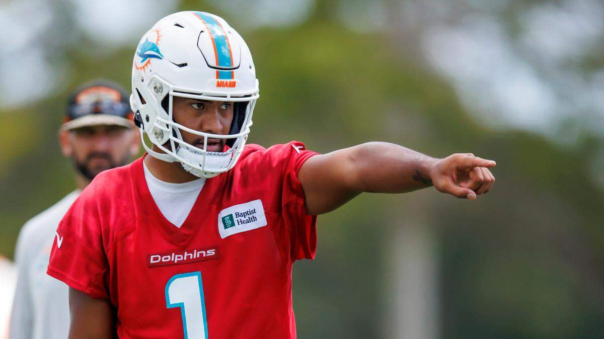 Miami Dolphins quarterback Tua Tagovailoa (1) gives instructions to his teammates during NFL football training camp at Baptist Health Training Complex in Hard Rock Stadium on Monday, September 5, 2022 in Miami Gardens, Florida.