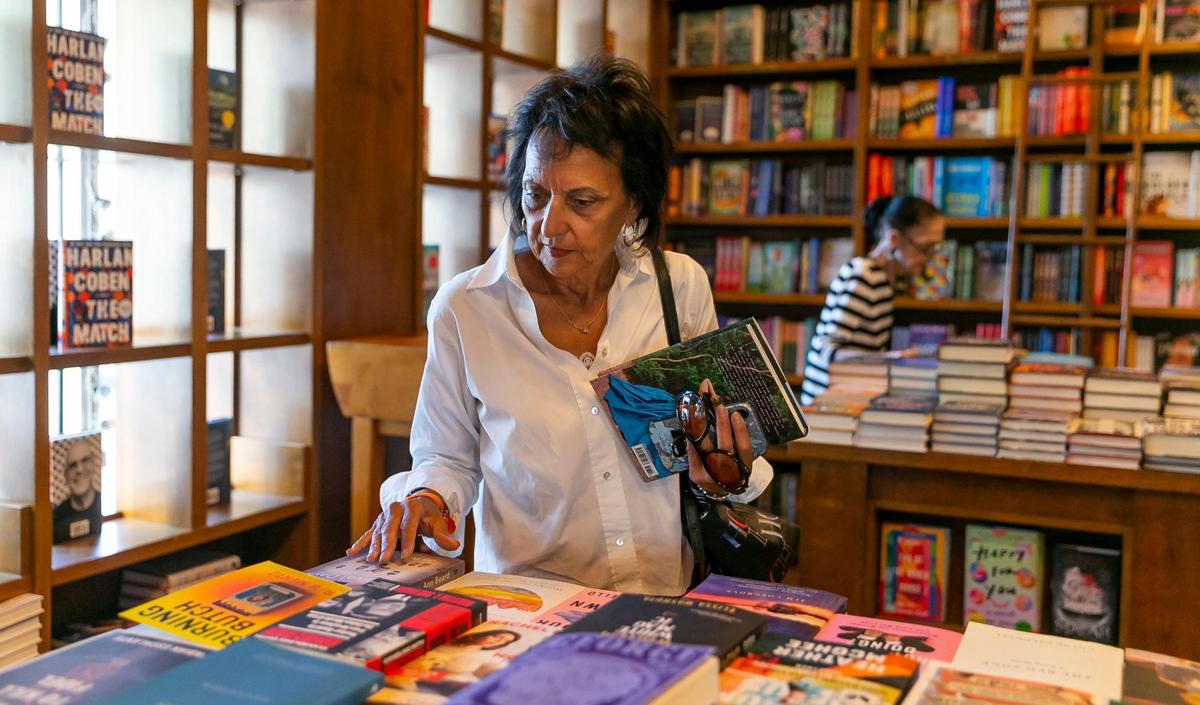Carolina Rendeiro shops for her next read at Books & Books in Coral Gables.