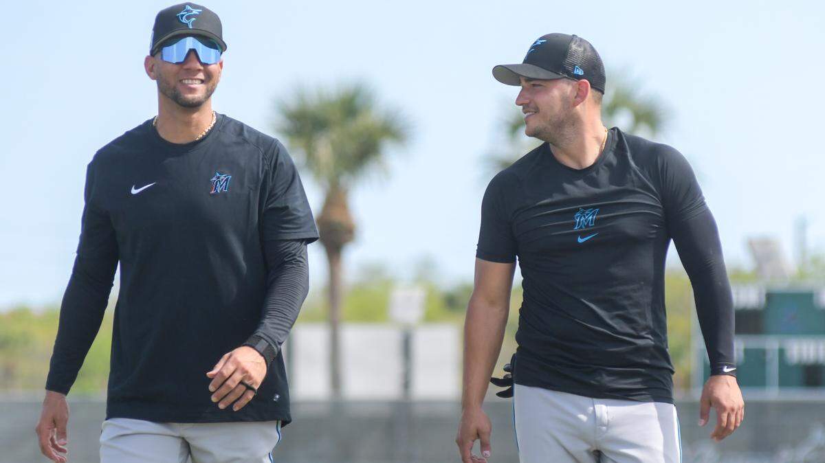 Miami Marlins first baseman Yuli Gurriel (left) and shortstop Jose Iglesias (right) prior to a workout on the back fields of the Roger Dean Chevrolet Stadium complex on Friday, March 10, 2023, in Jupiter, Florida.