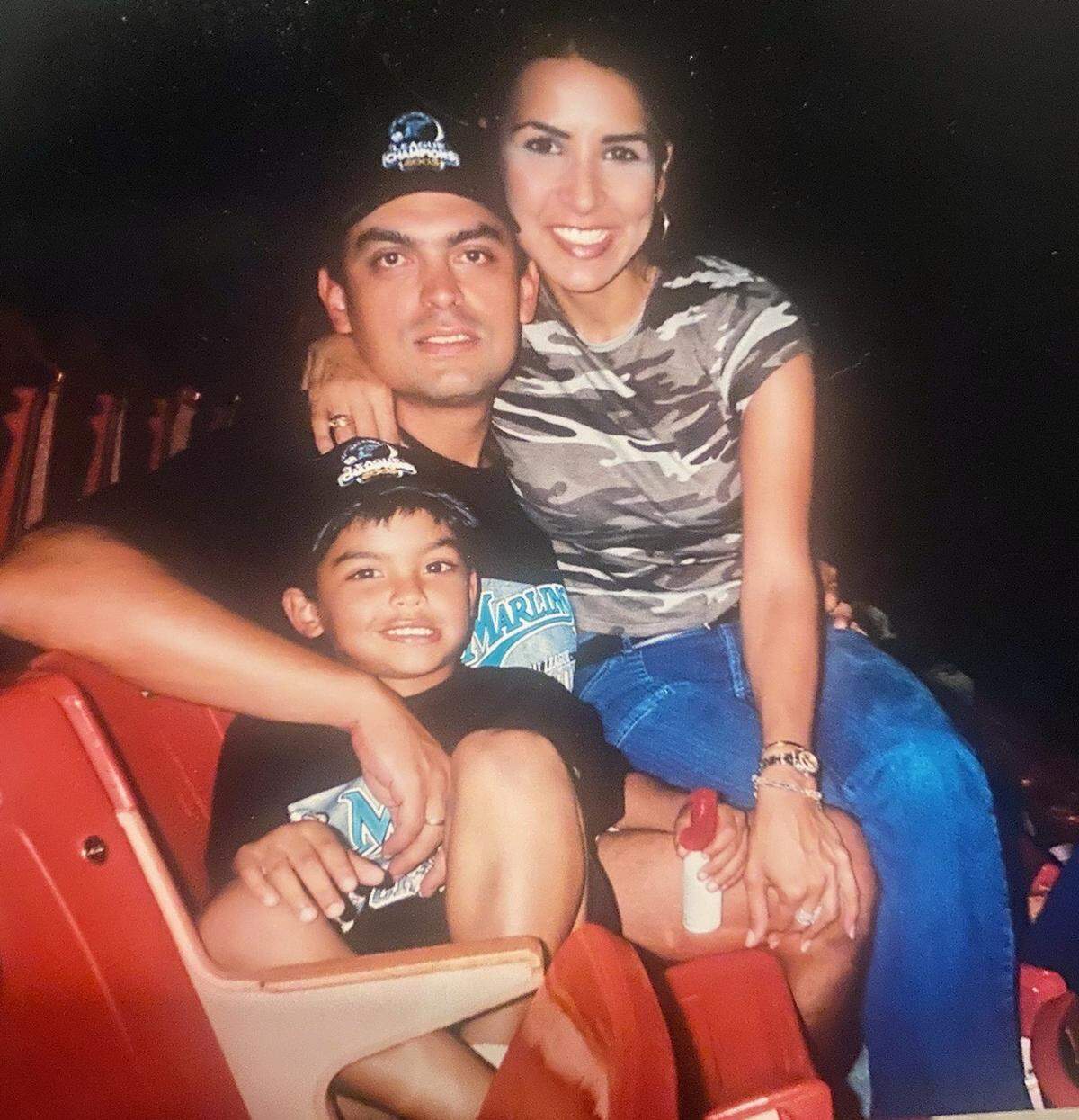 A young Jesus Luzardo with parents Jesus Luzardo Sr. and Monica Luzardo.
