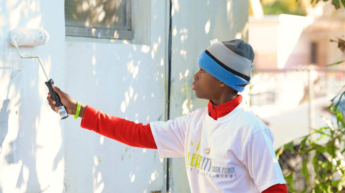 The city of North Miami and the new Clean City Task Force on Monday hosted Paint-It-Proud, a community service event to honor the Martin Luther King Day of Service. Over 100 volunteers painted the home of a 93-year-old senior resident, while other volunteers cleaned up Enchanted Forest Park.