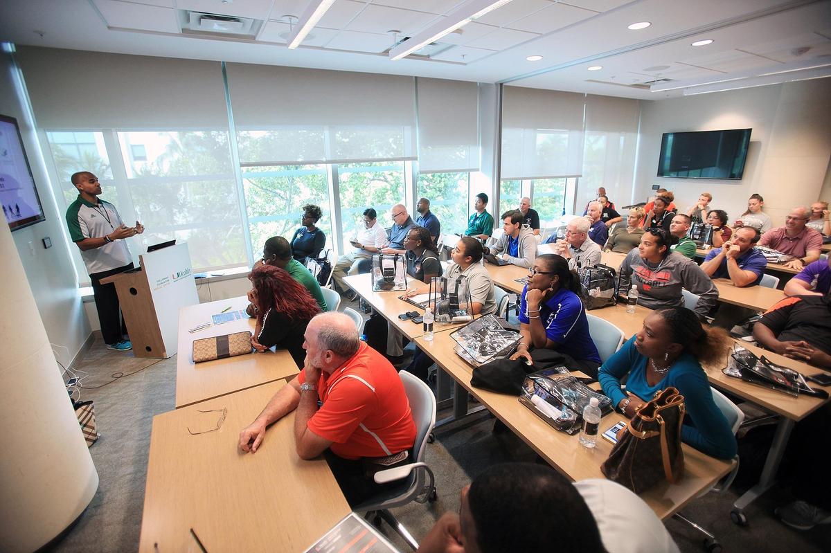 Raymond C. Crittenden, MSC, speaks to participants at the Concussion Clinic of the University of Miami, which is part of the UHealth Institute of Sports Medicine, on Wednesday, Aug. 1, 2018. The seminar educated coaches, trainers and athletic directors of Miami-Dade high schools on how to diagnose and immediately treat a concussion after a sports injury.