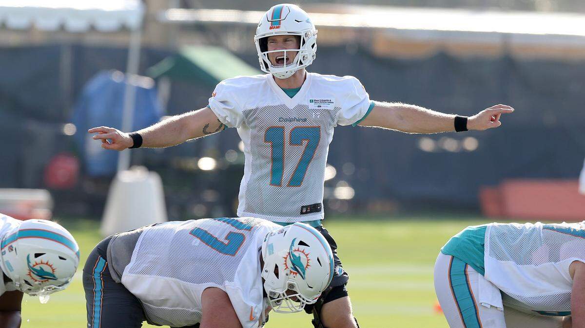 Ryan Tannehill was happily back under center for the Dolphins as 2018 training camp opened Thursday.