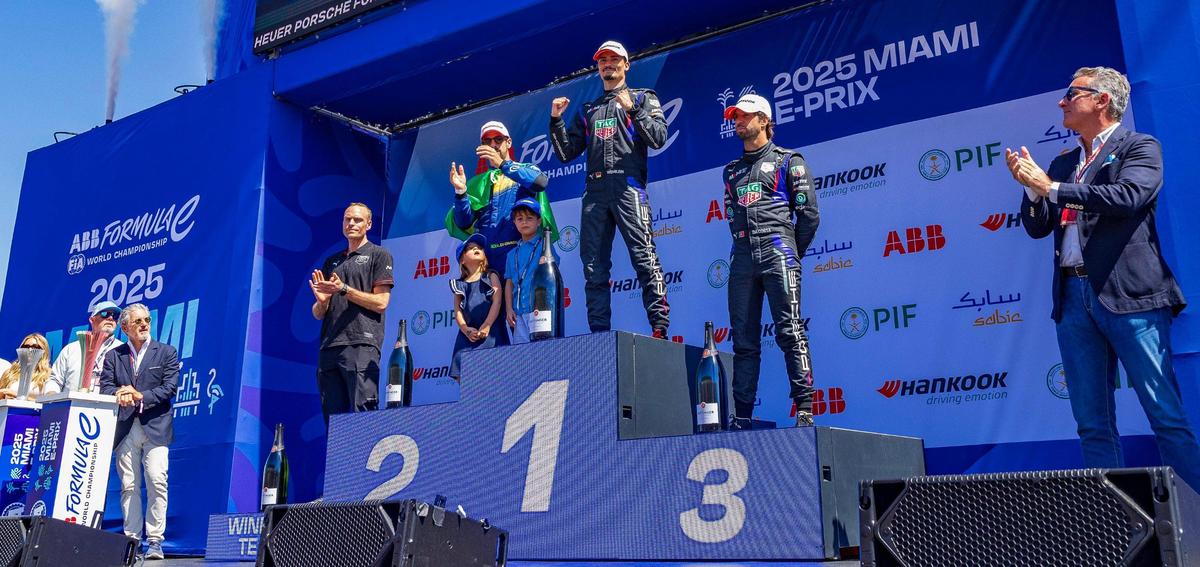 Winner Pascal Wehrlein of TAG Heuer Porsche Formula E Team, second place Lucas Di Grassi of Lola Yamaha ABT, and third place Antonio Felix Da Costa, Wehrlein’s teammate, during the award ceremony of the Miami E-Prix, Round 5 of the 2025 ABB FIA Formula E World Championship at Homestead-Miami Speedway on Saturday, April 12, 2025.