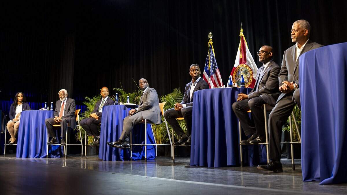 From left to right: Te Mayonna Brown, African Heritage Cultural Arts Center Managing Director Marshall L. Davis Sr., Former Miami-Dade commissioner Oliver Gilbert, Florida State Senator Shevrin Jones, Kendrick Meek Jr., Former Miami-Dade commissioner Jean Monestime and Miami Criminal Defense Attorney Roderick Darrell Vereen participate in a town hall debate ahead of the U.S. House Florida District 24 race at Florida Memorial University on Tuesday, June 30, 2026, in Miami Gardens, Fla.