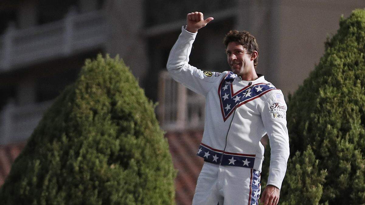 Travis Pastrana celebrates after jumping the fountain at Caesars Palace on a motorcycle Sunday, July 8, 2018, in Las Vegas. Pastrana recreated three of Evel Knievel’s iconic motorcycle jumps on Sunday, including the leap over the fountains of Caesars Palace that left Knievel with multiple fractures and a severe concussion.