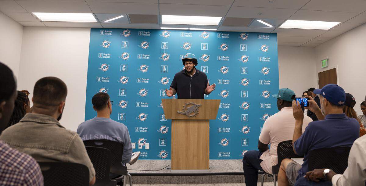 Kadyn Proctor, who played offensive tackle with the Alabama Crimson Tide, speaks during a press conference at the Baptist Health Training Complex on Friday, April 24, 2026, in Miami Gardens, Fla. The Dolphins selected Proctor as the 12th overall pick in the first round of the NFL Draft.