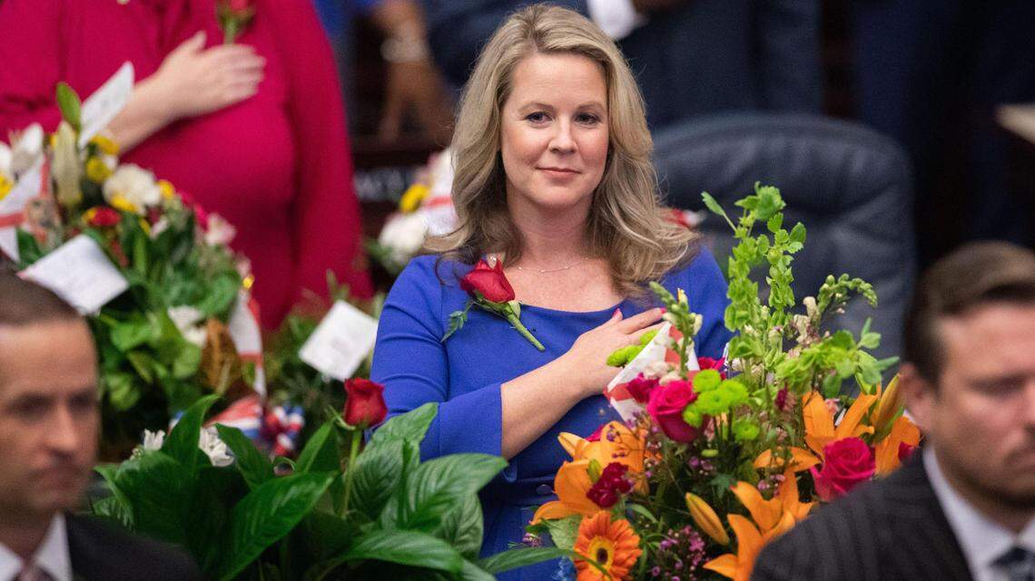 Rep. Jenna Persons-Mulicka places her hand over her heart during the Pledge of Allegiance on the opening day of the 2023 Florida Legislative Session, Tuesday, March 7, 2023.