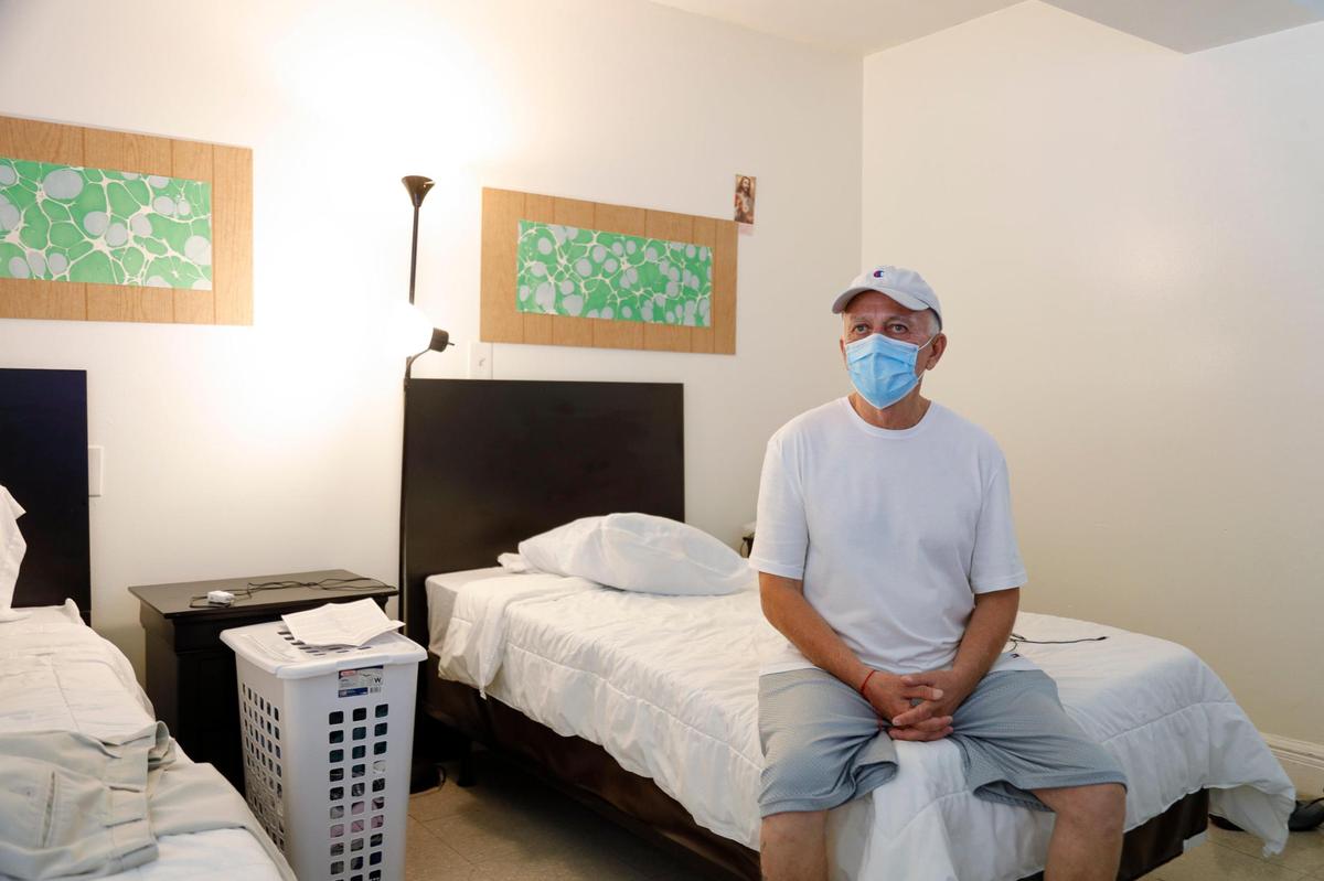 Jose Manuel Duran, 67, sits on his bed at Mia Casa, which the Miami-Dade Homeless Trust is leasing to care for homeless seniors.