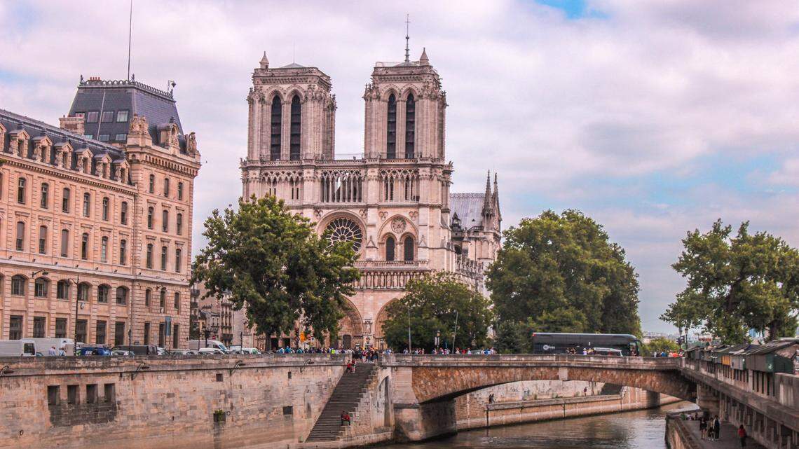 A 27-year-old American tourist was raped in a public toilet while visiting central Paris, near the Notre Dame Cathedral, with her partner, French police say.